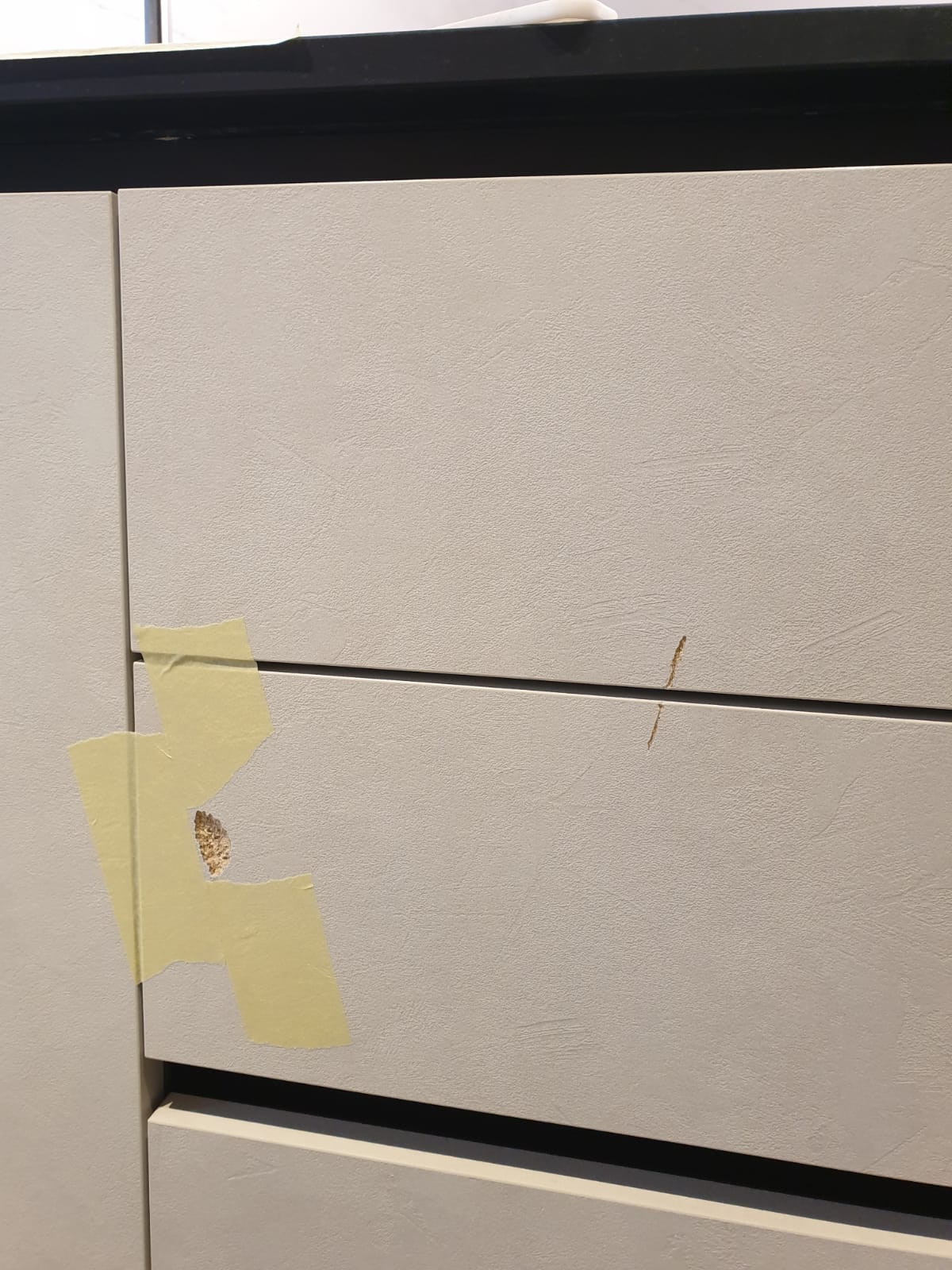 Kitchen cabinet drawer front damage