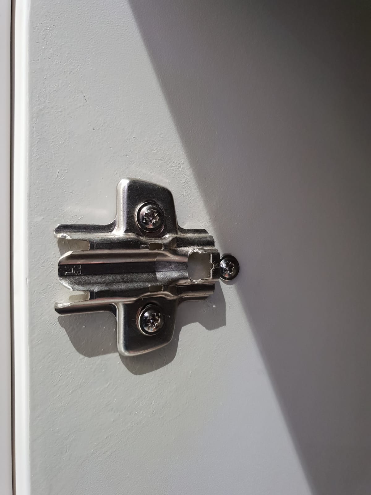 Utility cabinet latch area repaired